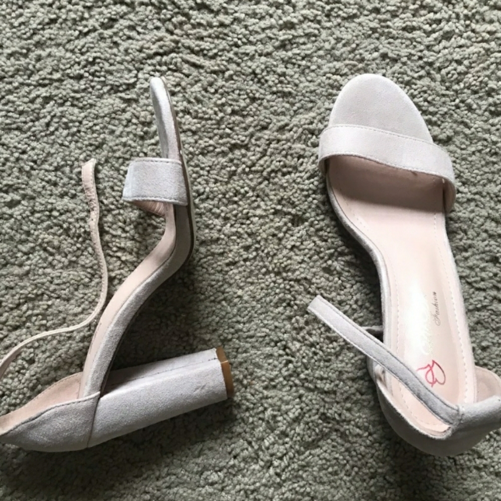 Stoned/light pink colored block heels